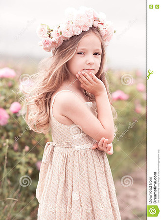 cute-child-girl-posing-rose-garden-smiling-baby-year-old-wearing-stylish-dress-wreath-roses-outdoors-looking-camera-77441608
