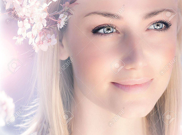 12589049-sensual-portrait-of-a-spring-woman-beautiful-face-female-enjoying-cherry-blossom-dreamy-girl-with-pi