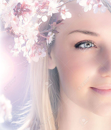 12589030-sensual-portrait-of-a-spring-woman-beautiful-face-female-enjoying-cherry-blossom-dreamy-girl-with-pi