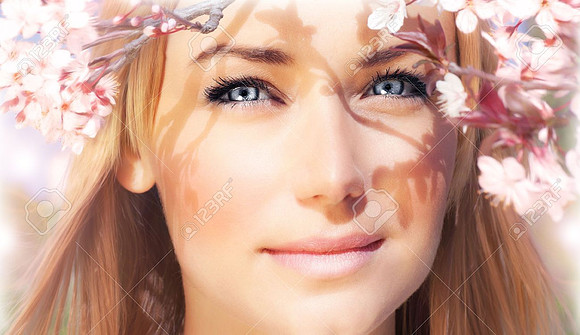 12589161-sensual-portrait-of-a-spring-woman-beautiful-face-female-enjoying-cherry-blossom-dreamy-girl-with-pi